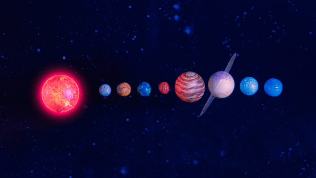 A majestic celestial tableau of planets in the astrological realm. In the foreground, a radiant sun with its powerful, golden aura, representing the central role of the sun in astrology. Surrounding it, the eight principal planets - Mercury, Venus, Mars, Jupiter, Saturn, Uranus, Neptune, and Pluto - each shimmering with its own distinct hue and personality, as if dancing in a cosmic ballet. In the middle ground, a swirling nebula of stars and galaxies, hinting at the vast, interconnected nature of the astrological universe. The background is a deep, inky blackness of space, punctuated by the occasional shooting star, creating a sense of depth and mystery. Warm, diffused lighting bathes the scene, evoking a sense of ancient wisdom and mystical significance. The Role of Planets in Astrology