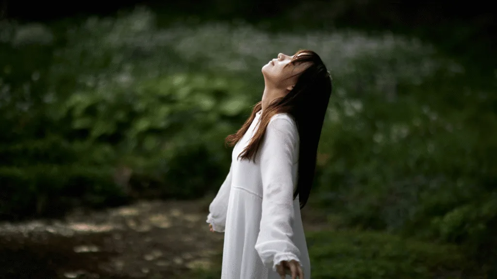 Embracing divine consciousness — illustration of a person radiating light to represent spiritual awareness Spiritual Awakening Embracing Our Luminous Nature